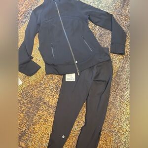 Blue Lululemon jacket, zip up jacket and leggings set